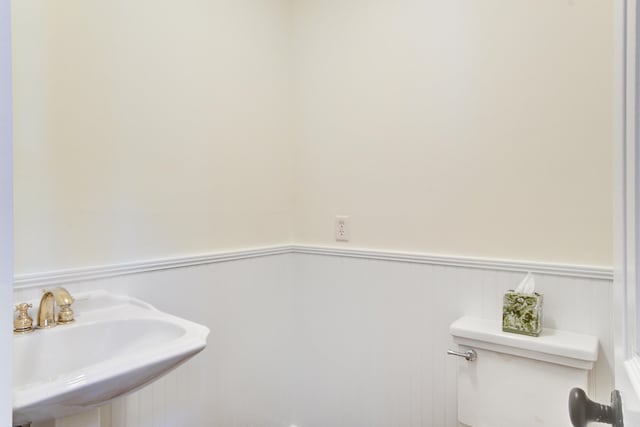 1541 Diamond Blvd, Mount Pleasant, SC 29466 - half bath with toilet, a sink, and a wainscoted wall