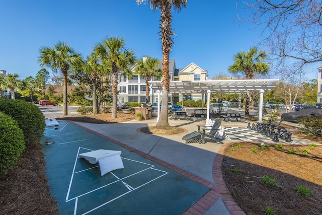 view of property's community with a pergola