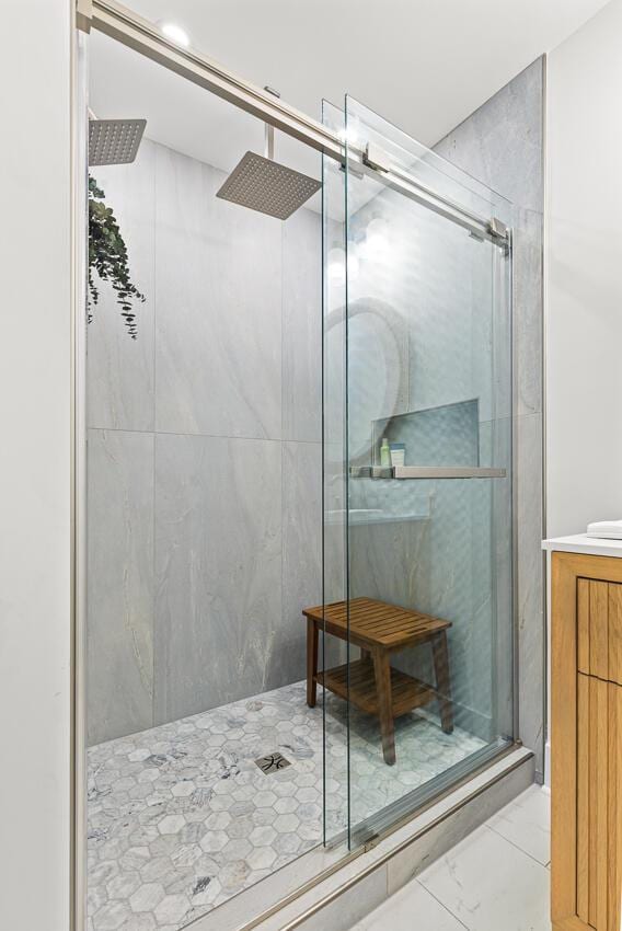 bathroom with vanity and walk in shower