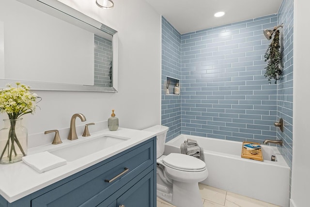 full bathroom with tiled shower / bath combo, vanity, and toilet