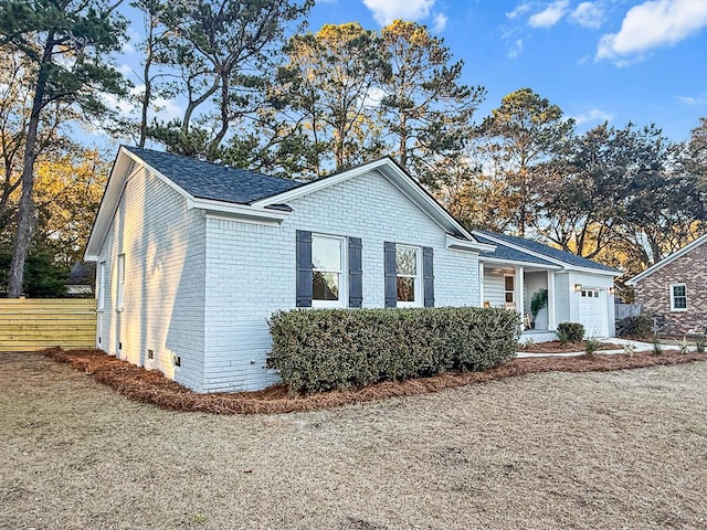 view of property exterior featuring a garage