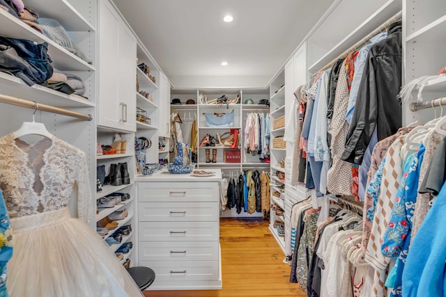 walk in closet featuring light wood-style floors