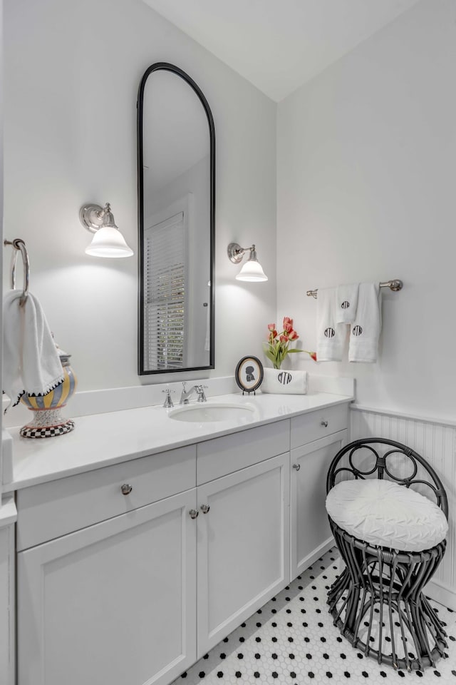 bathroom featuring vanity and wainscoting