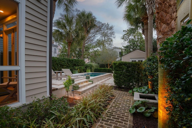 exterior space with a patio and a swimming pool