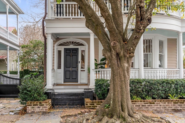 entrance to property with a porch