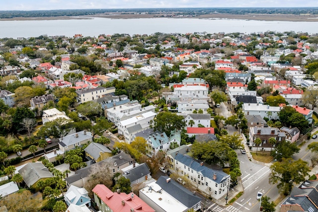 birds eye view of property featuring a residential view and a water view