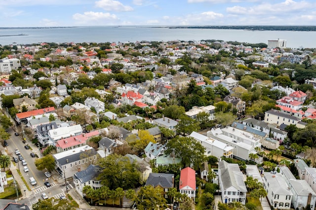 birds eye view of property featuring a residential view and a water view