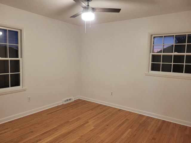 unfurnished room featuring ceiling fan and light hardwood / wood-style flooring