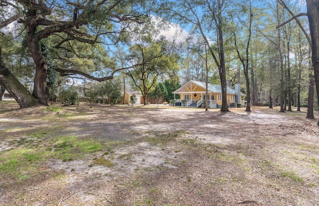 view of yard with a porch