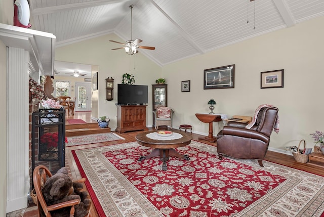 living room featuring ceiling fan, high vaulted ceiling, wood-type flooring, and beamed ceiling