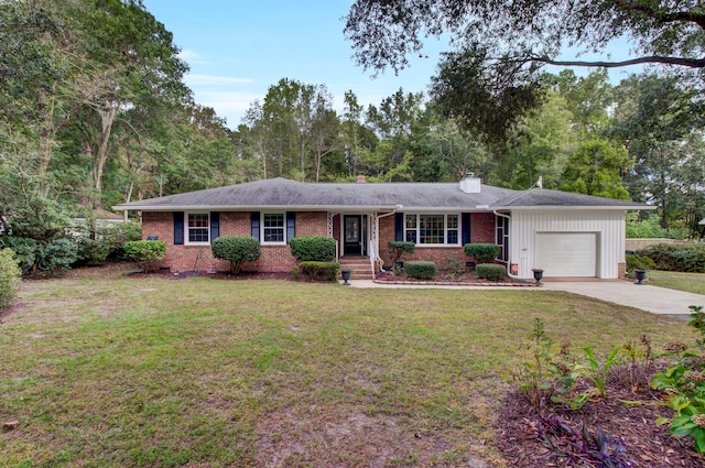 ranch-style home with a front lawn and a garage