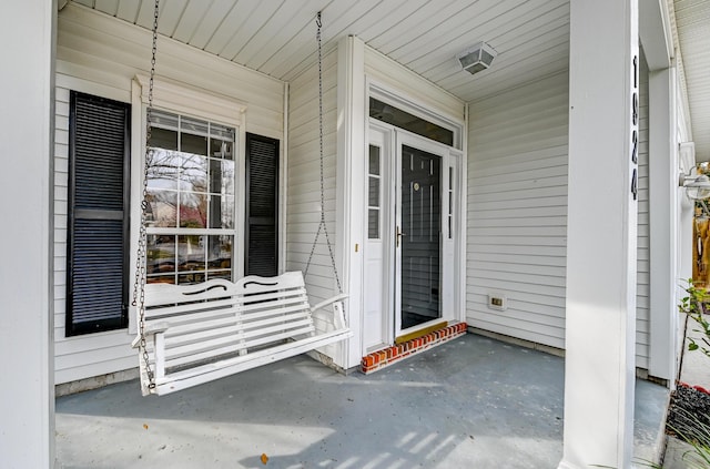 entrance to property with a porch