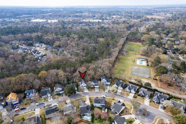 birds eye view of property with a residential view