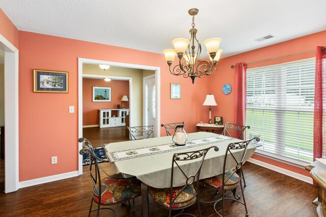 160 Syrr Run Rd, Saint George, SC 29477 - dining space with a chandelier, dark wood-type flooring, and baseboards