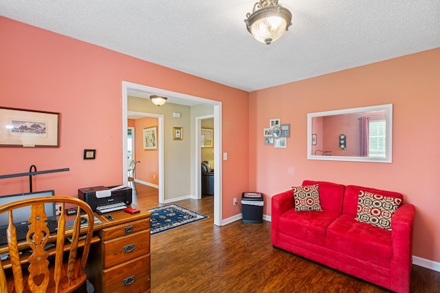 160 Syrr Run Rd, Saint George, SC 29477 - living room with dark wood finished floors, baseboards, a desk, and a textured ceiling