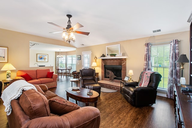 160 Syrr Run Rd, Saint George, SC 29477 - living room with wood finished floors, ceiling fan, and a brick fireplace