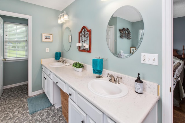 160 Syrr Run Rd, Saint George, SC 29477 - bathroom with double vanity and baseboards