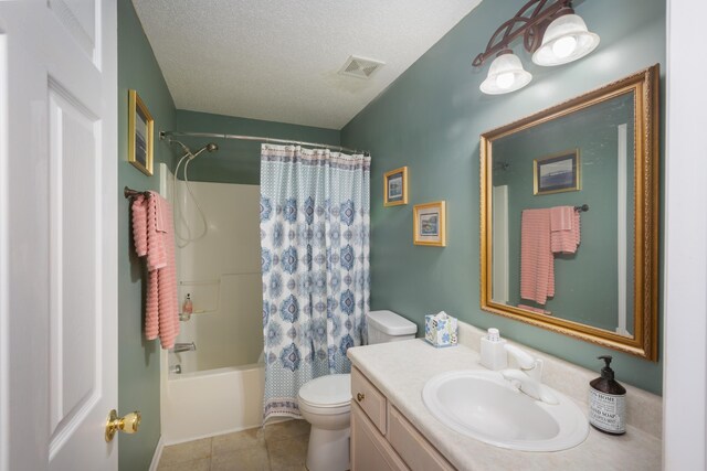 160 Syrr Run Rd, Saint George, SC 29477 - full bathroom featuring toilet, vanity, shower / bath combination with curtain, tile patterned floors, and a textured ceiling