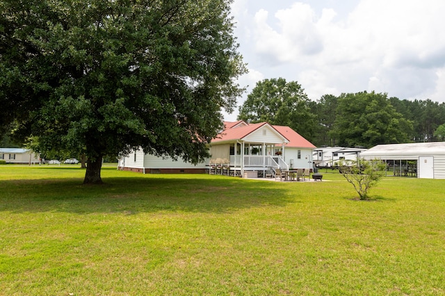 160 Syrr Run Rd, Saint George, SC 29477 - view of grassy yard with a carport
