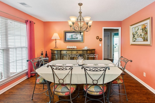 160 Syrr Run Rd, Saint George, SC 29477 - dining room featuring a chandelier, baseboards, and dark wood finished floors
