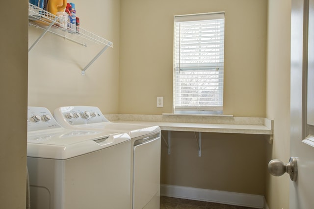 laundry area with washing machine and dryer