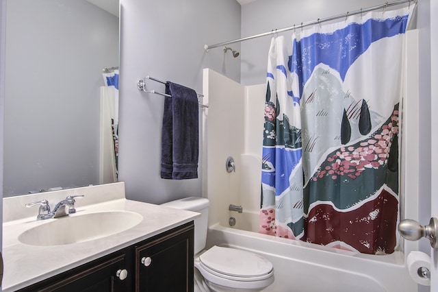 full bathroom featuring toilet, shower / bath combo with shower curtain, and vanity