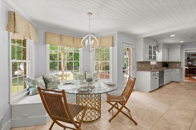 tiled dining area with an inviting chandelier, ornamental molding, wood ceiling, and sink