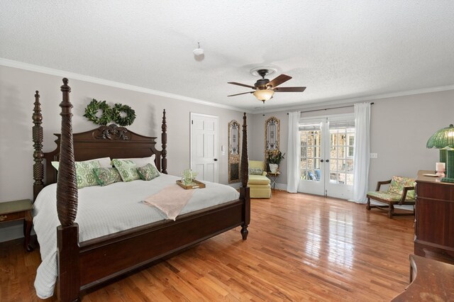 bedroom with access to outside, hardwood / wood-style floors, ornamental molding, and ceiling fan