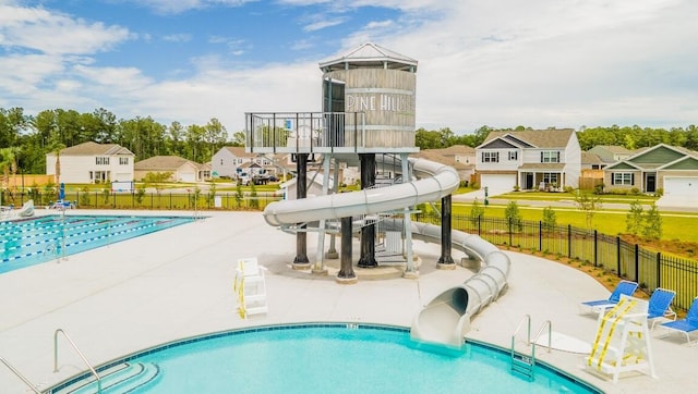 518 Golden Embers Way, Summerville, SC 29486 - community pool featuring a water slide, a residential view, and a patio area