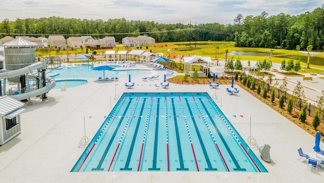 518 Golden Embers Way, Summerville, SC 29486 - community pool with a patio and view of wooded area