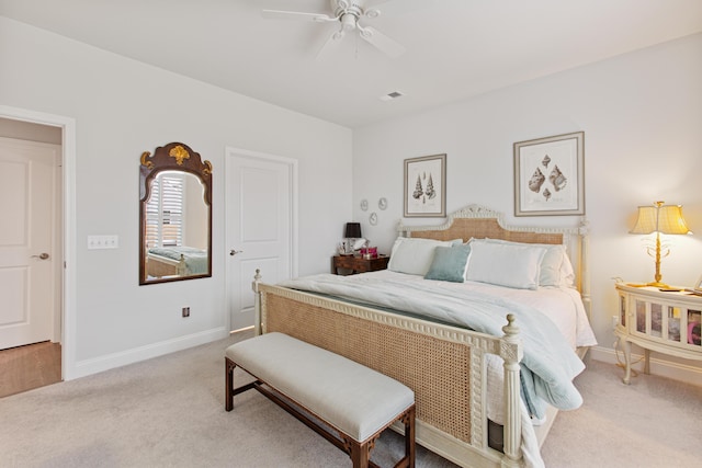 bedroom with baseboards, carpet flooring, and a ceiling fan