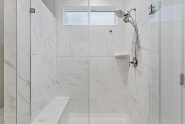 bathroom featuring a stall shower