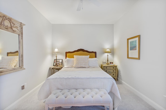 carpeted bedroom with baseboards and ceiling fan