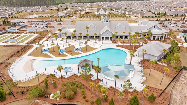 birds eye view of property with a residential view