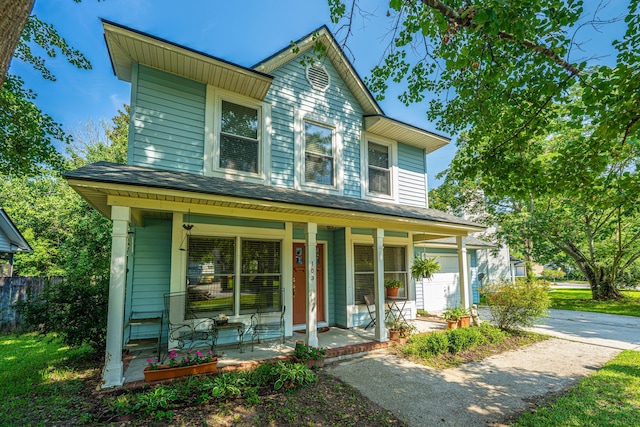 103 Toura Ln, Charleston, SC 29414 - view of front of property featuring a porch, concrete driveway, and a garage