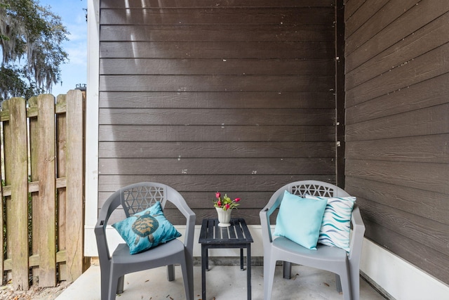 view of patio / terrace featuring fence