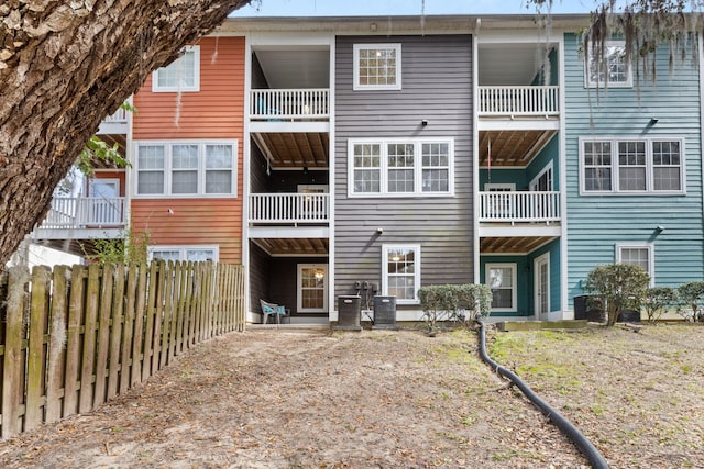 back of property with fence