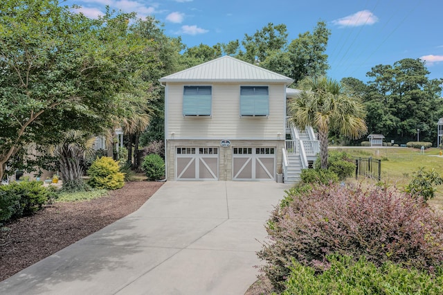 view of side of home with a garage