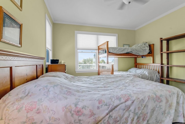 bedroom with ceiling fan and crown molding