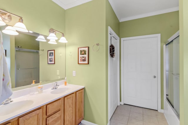 full bathroom featuring tile patterned floors, an enclosed shower, and a sink