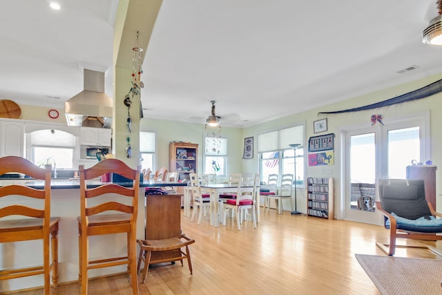 dining room featuring light wood-type flooring