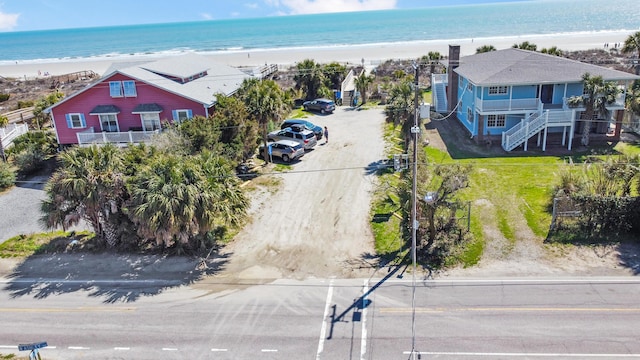 aerial view featuring a beach view and a water view