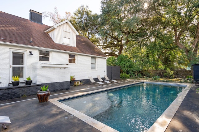 view of pool with a patio area