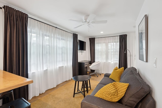 living room with ceiling fan