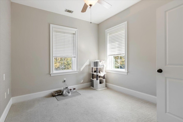 misc room featuring carpet floors and ceiling fan