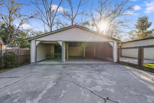 garage with fence