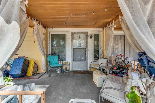 property entrance with a patio area