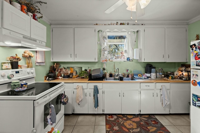 kitchen featuring light tile patterned flooring, under cabinet range hood, white appliances, a sink, and light countertops