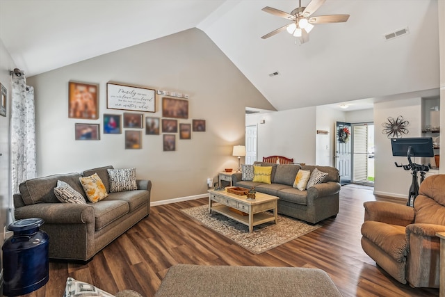 living room with visible vents, a ceiling fan, and wood finished floors