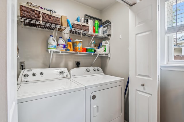 washroom featuring laundry area and independent washer and dryer